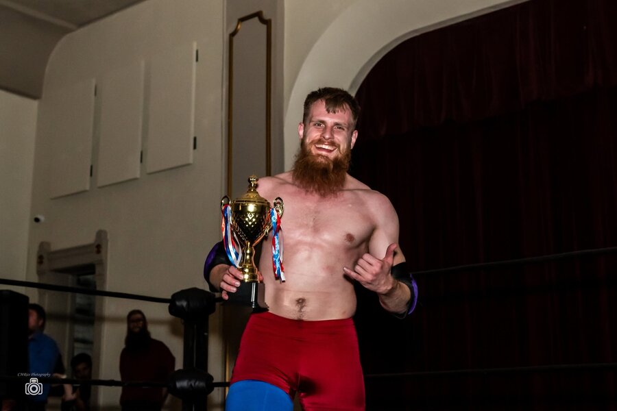 Zeak Gallent with the City of Lights Tournament trophy